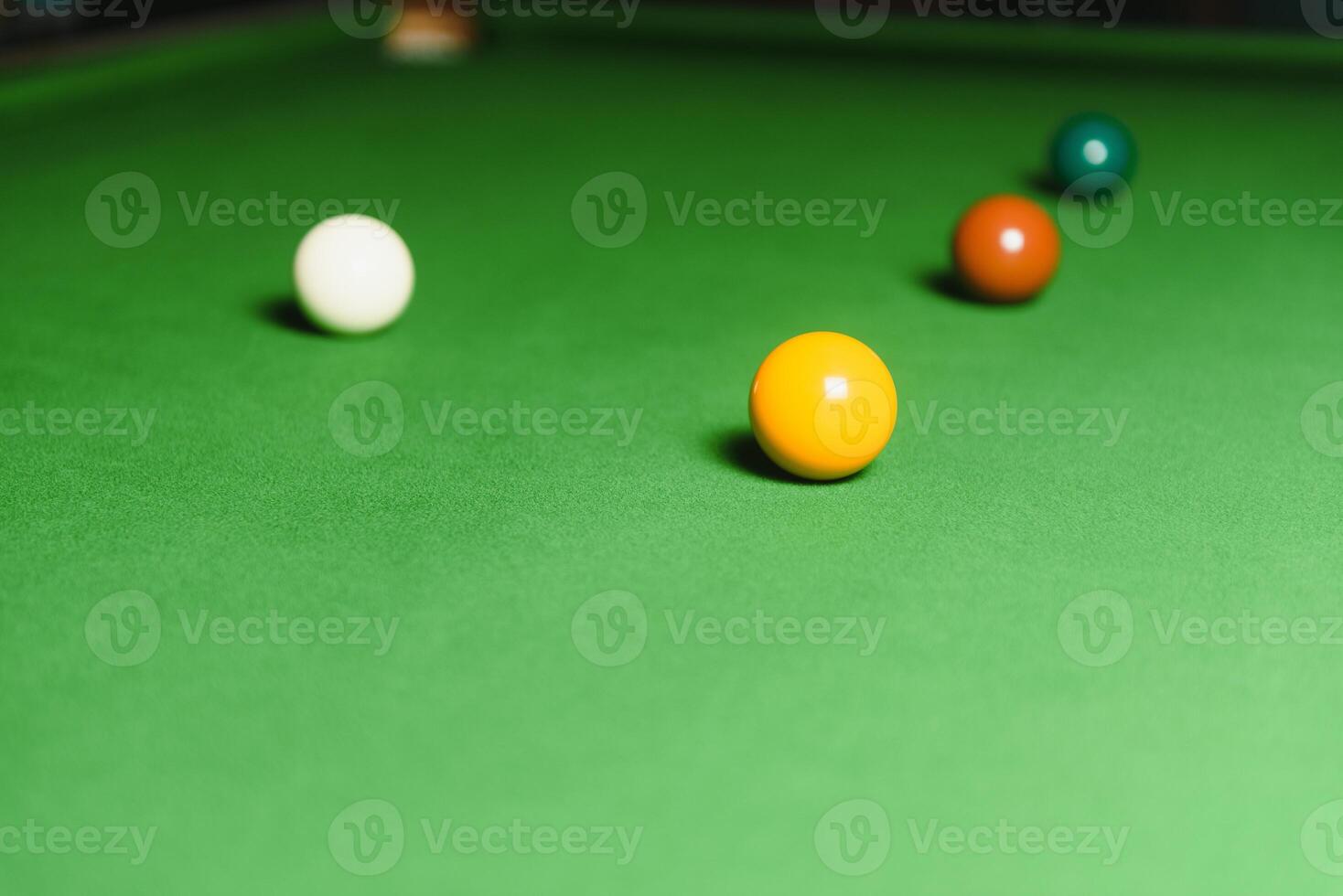 snooker balls set on a green table photo