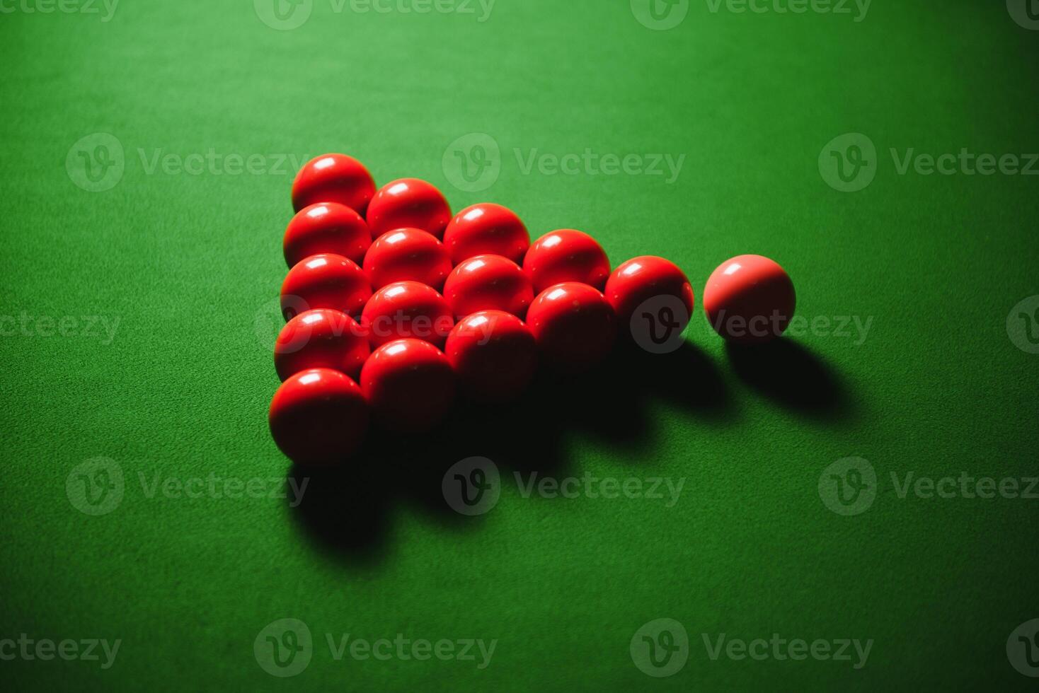 snooker balls on green surface, shallow depth of field photo