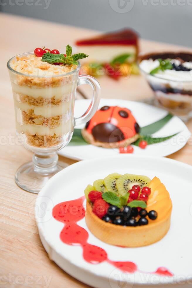 different desserts on the table in a cafe photo