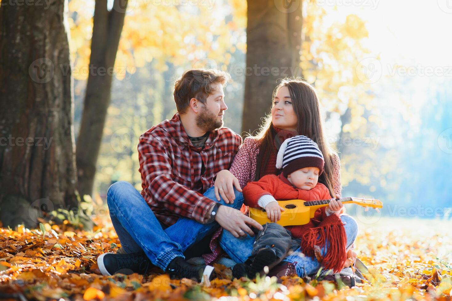 Portrait of family during the autumn photo