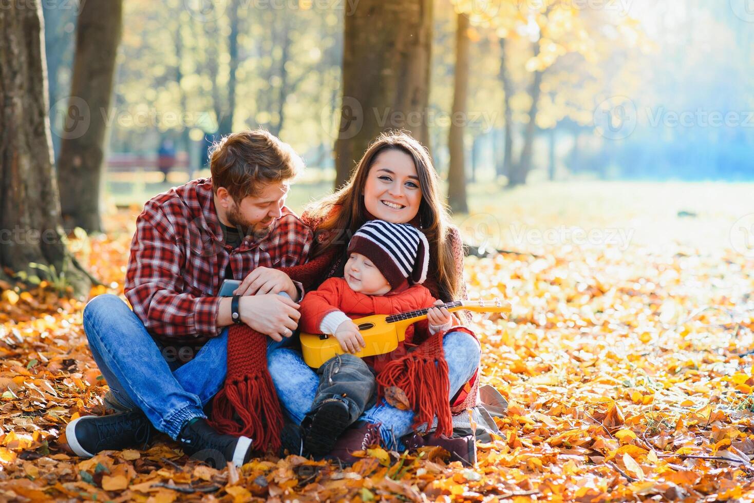 Portrait of family during the autumn photo
