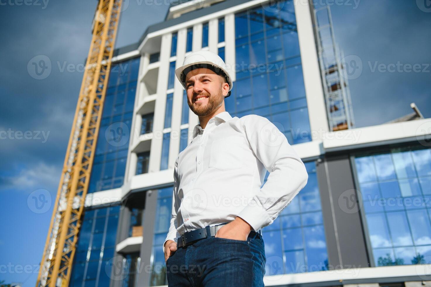 A construction worker control in the construction of roof structures on construction site and sunset background photo