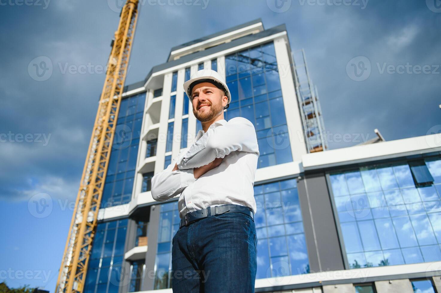 A construction worker control in the construction of roof structures on construction site and sunset background photo