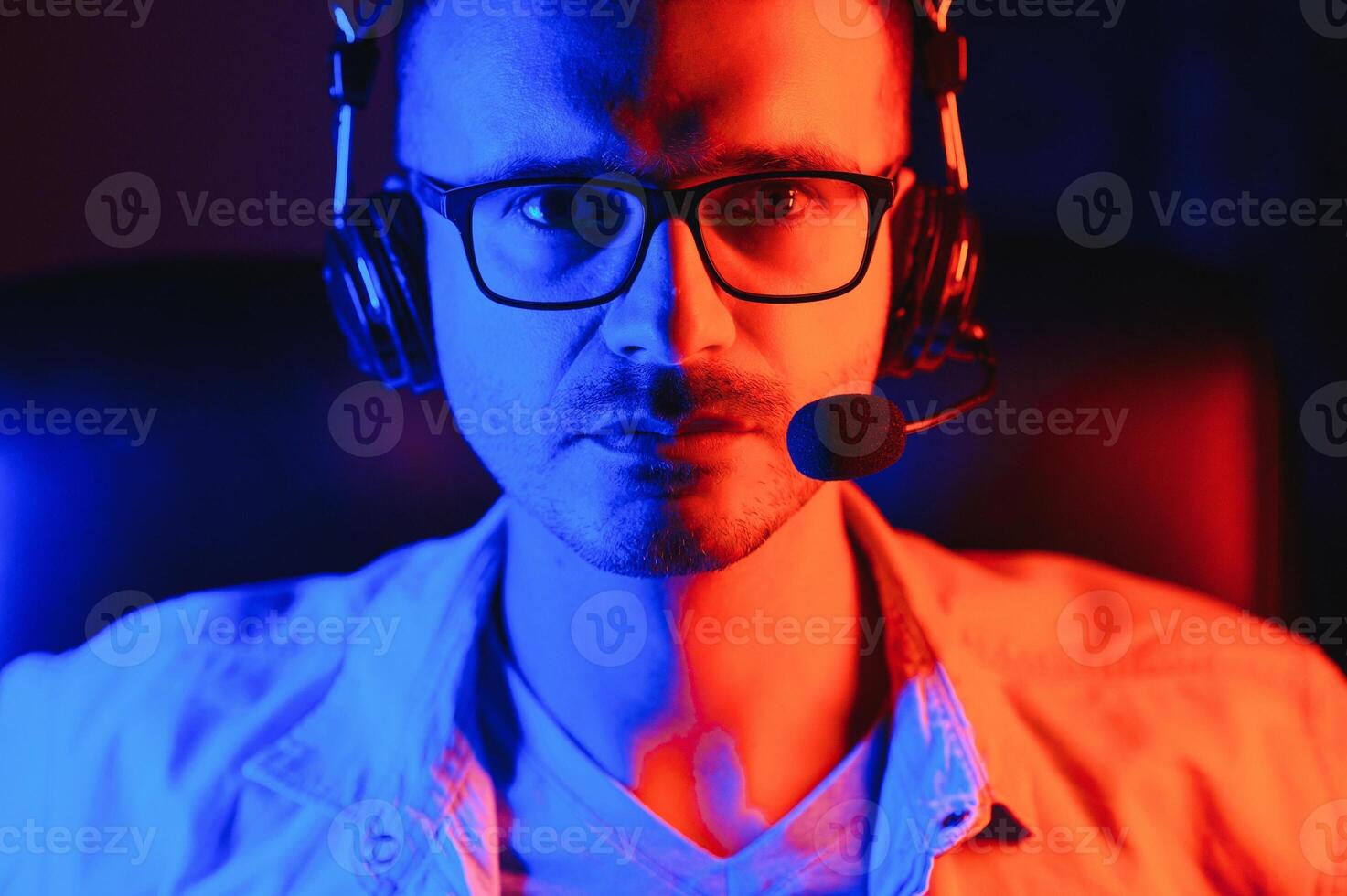 Gamer playing a first person shooter on high end pc. photo