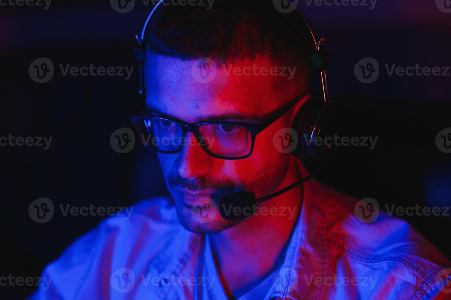 Gamer playing a first person shooter on high end pc. photo
