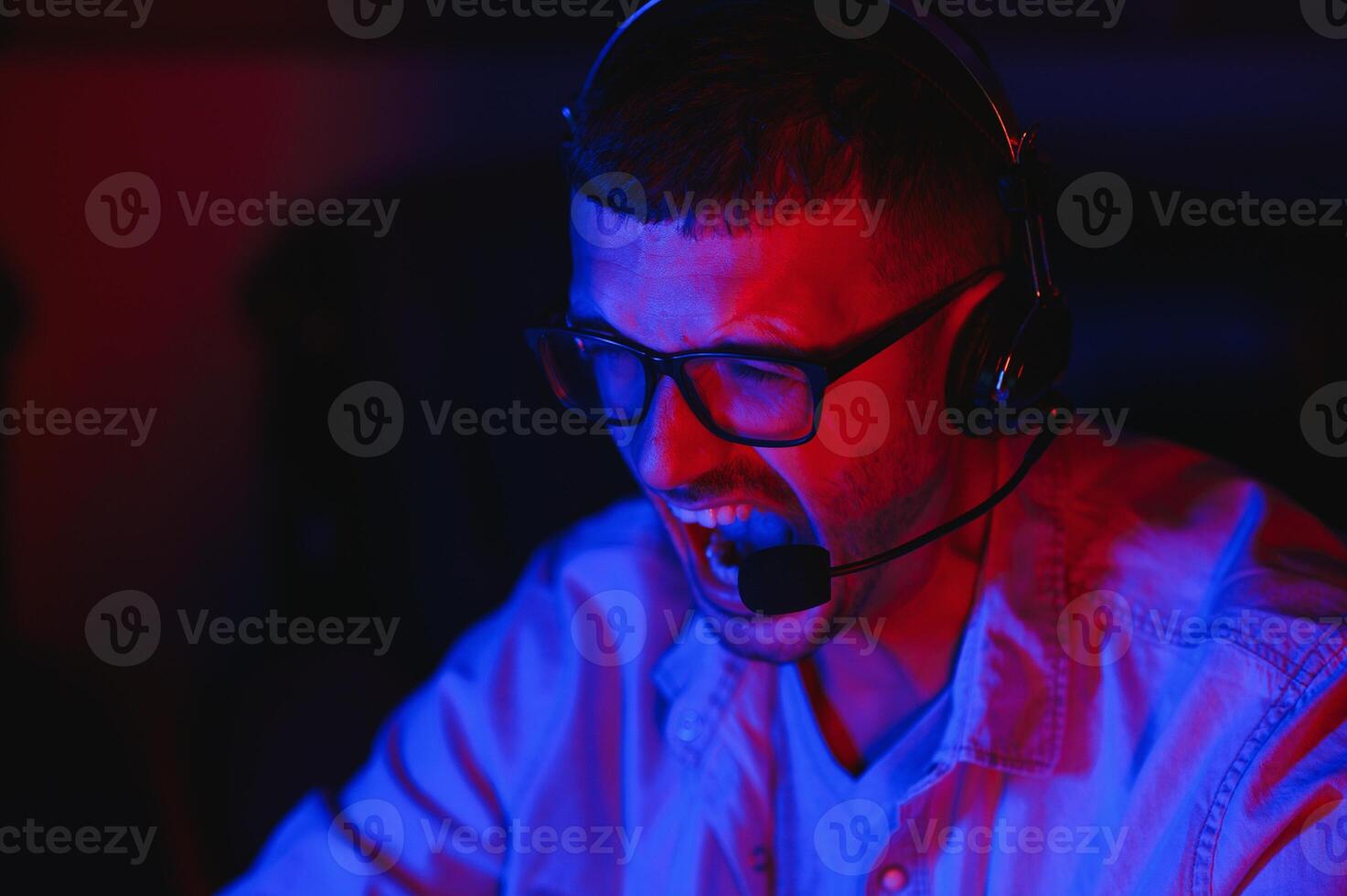 Gamer playing a first person shooter on high end pc. photo