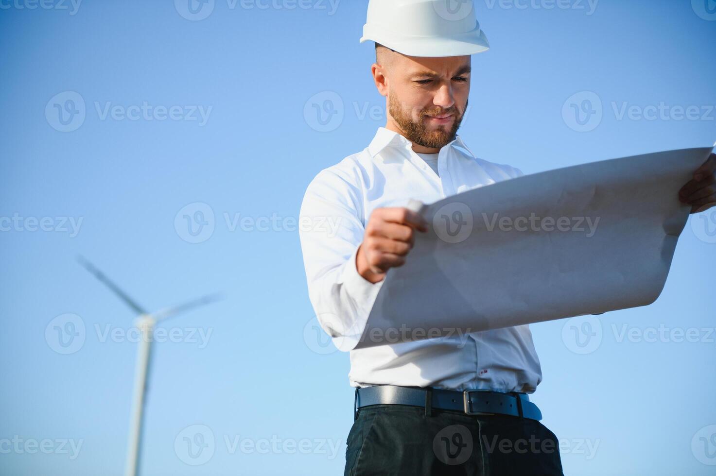 Power engineer are working with wind turbines. photo