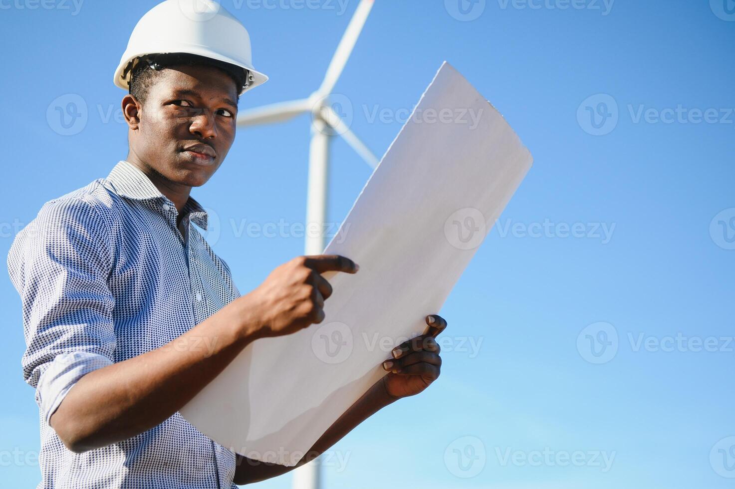 Power engineer are working with wind turbines. photo