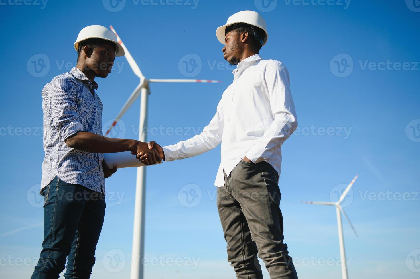 Engineers windmills for production of electric power. photo