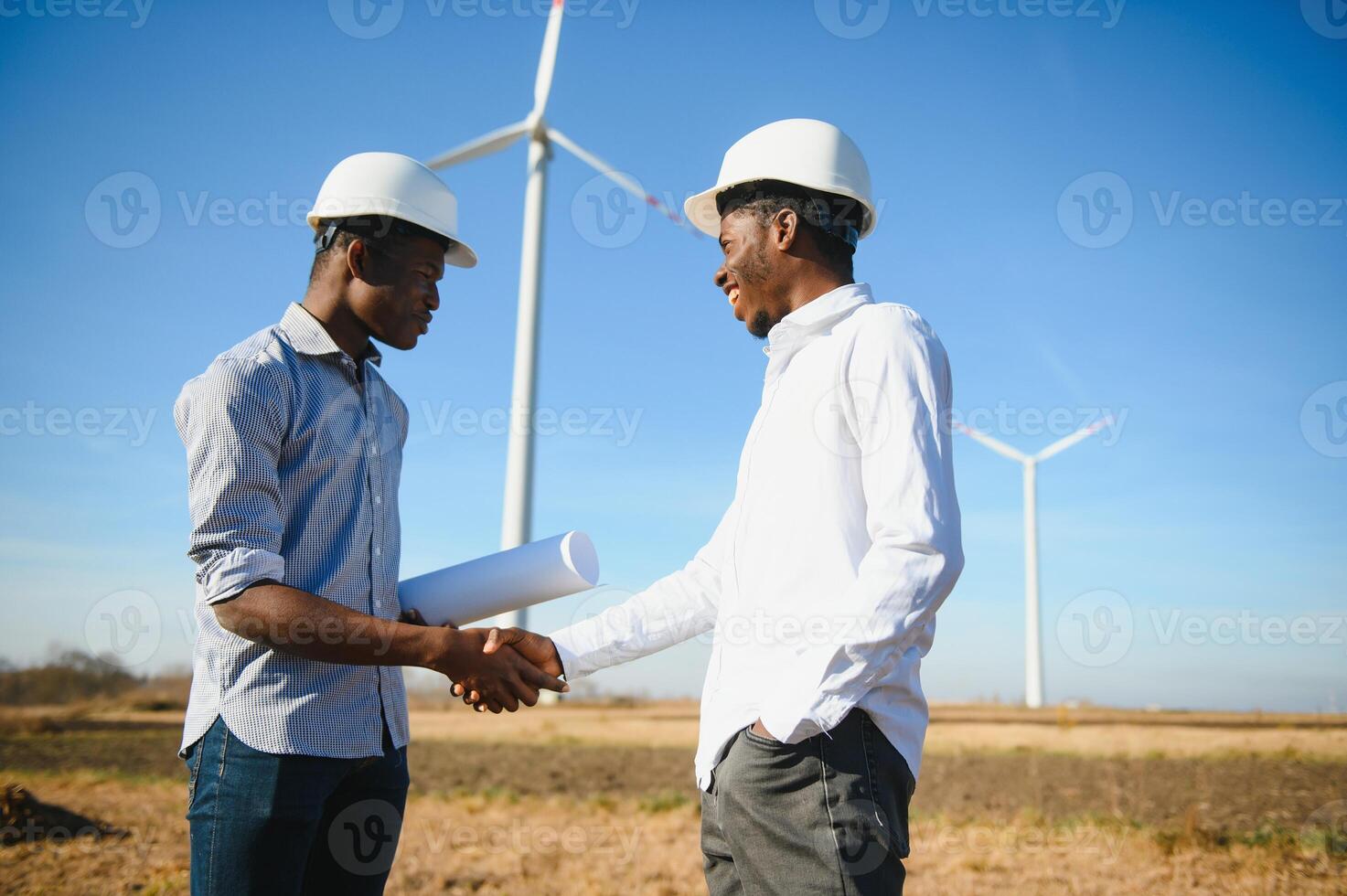 Engineers windmills for production of electric power. photo