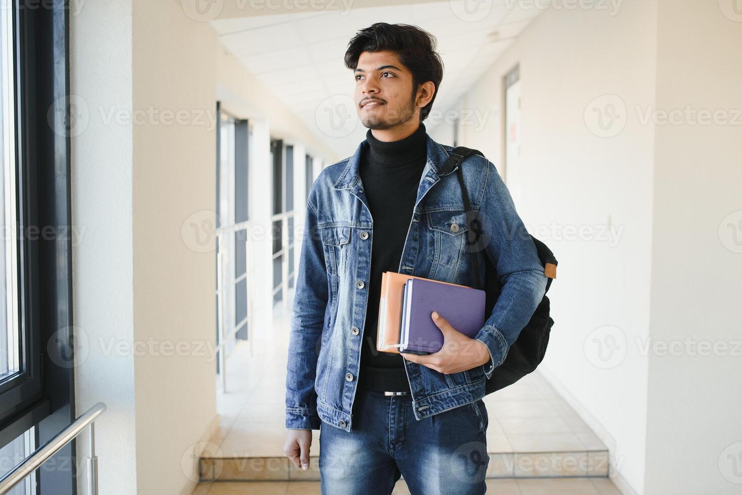Handsome and young indian Male college student. photo