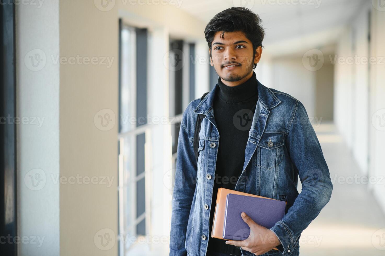 Handsome and young indian Male college student. photo