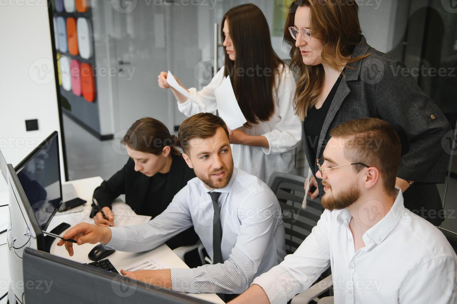 Business people working on project in office photo