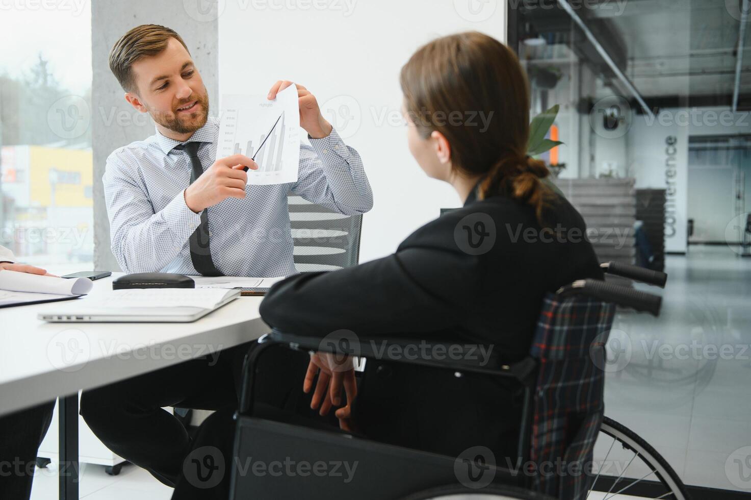 Confident and successful team. Group of people are working together in office. Blurred background photo