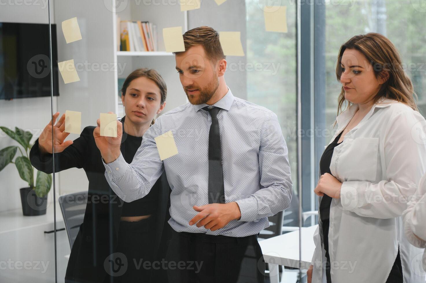 Corporate business team and in a meeting at modern office with big windows . High quality photo