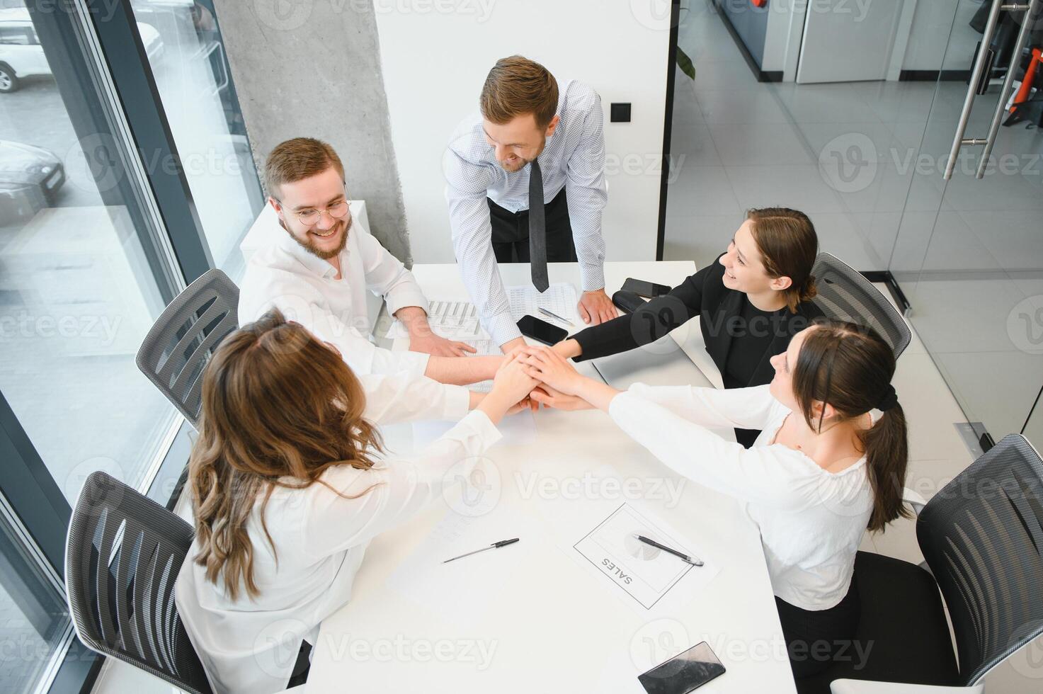 A group of business people partners during a set team meeting in the modern office. Teamwork concept photo
