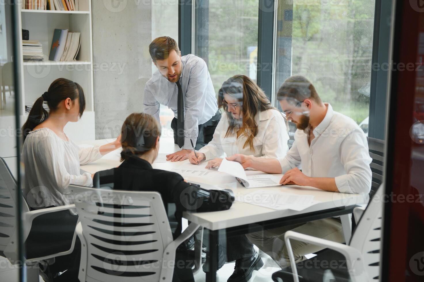 Corporate business team and in a meeting at modern office with big windows . High quality photo