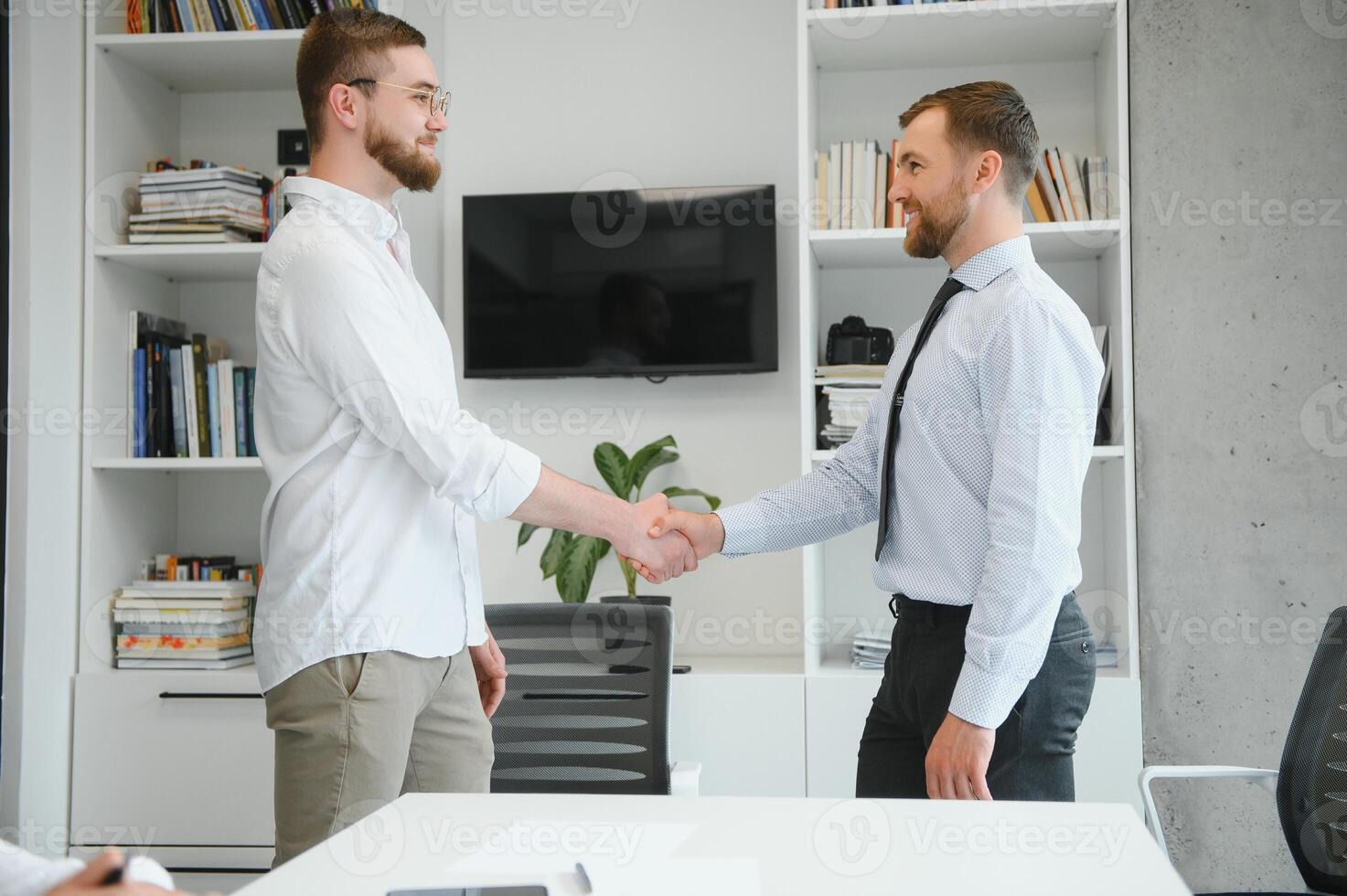 A group of business people partners during a set team meeting in the modern office. Teamwork concept photo