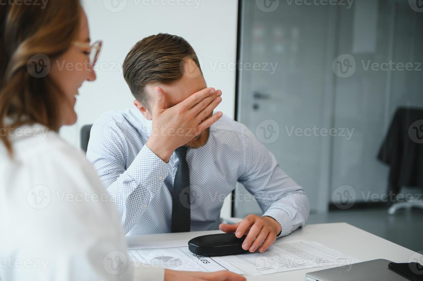 Confident and successful team. Group of people are working together in office. Blurred background photo