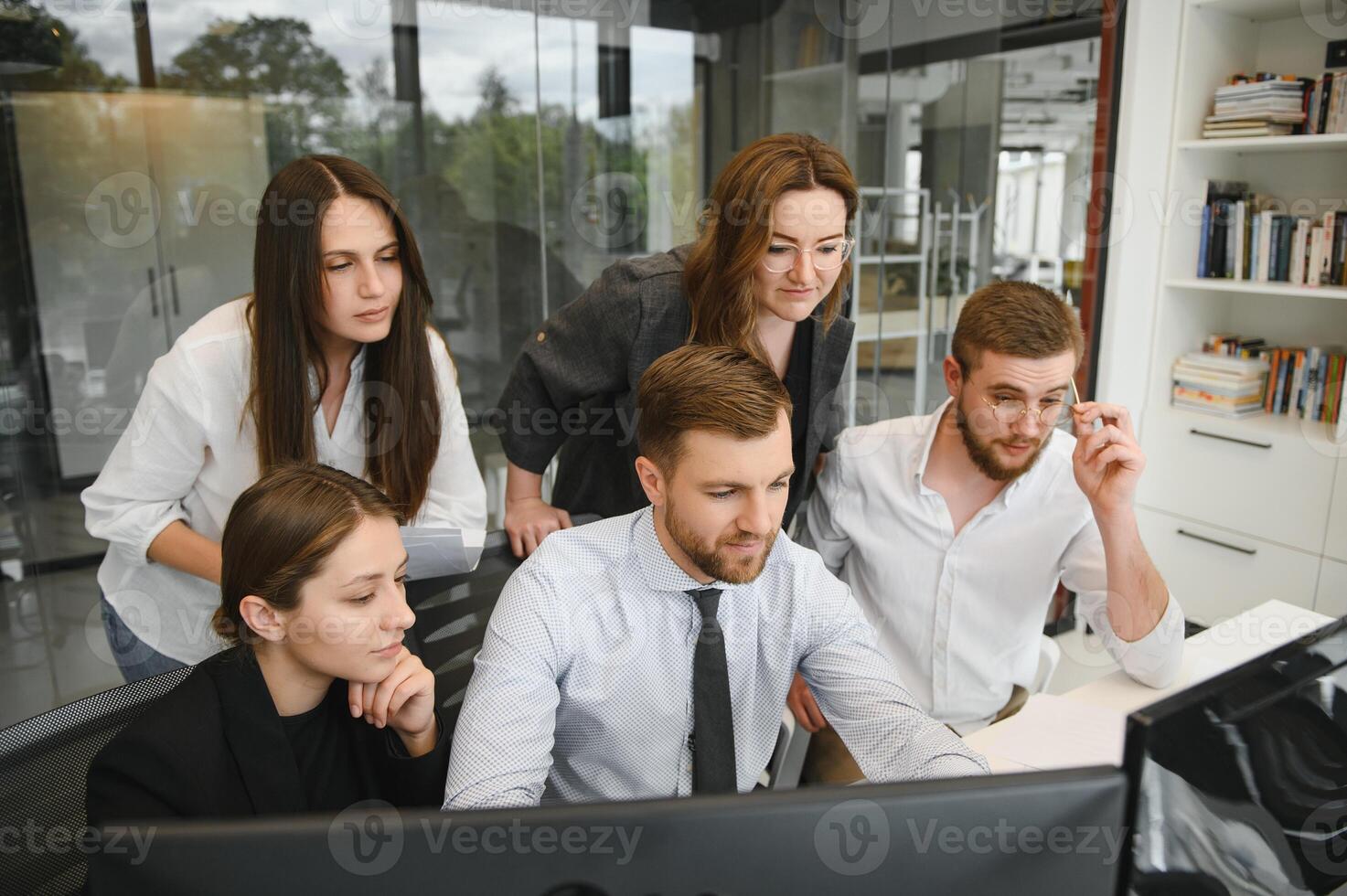 Corporate business team and manager in a meeting room at modern office with panoramic windows. Business concept photo
