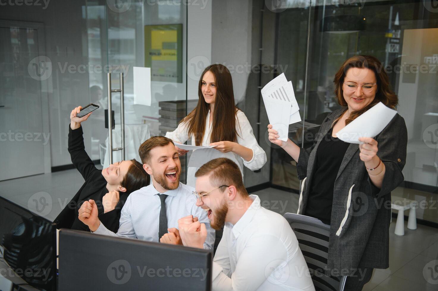 Group of businessmen and businesswomen stock brokers working at office. photo