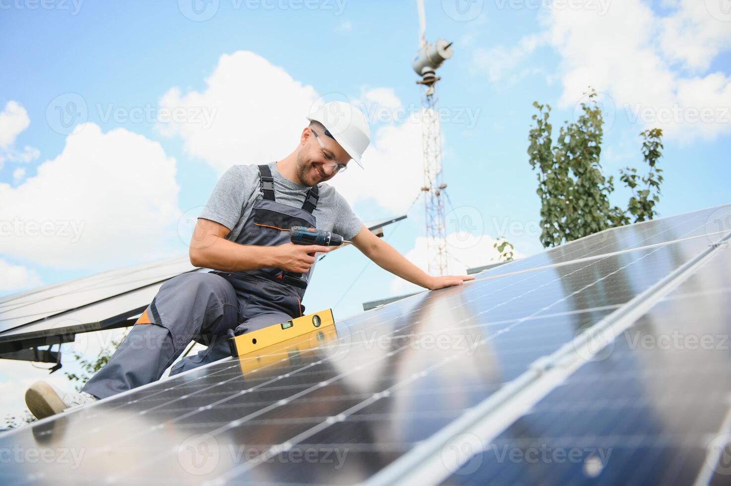 A man working at solar power station. photo