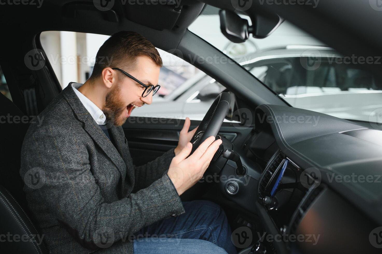 Man adult customer male buyer client wears classic suit white shirt chooses auto wants to buy new automobile photo