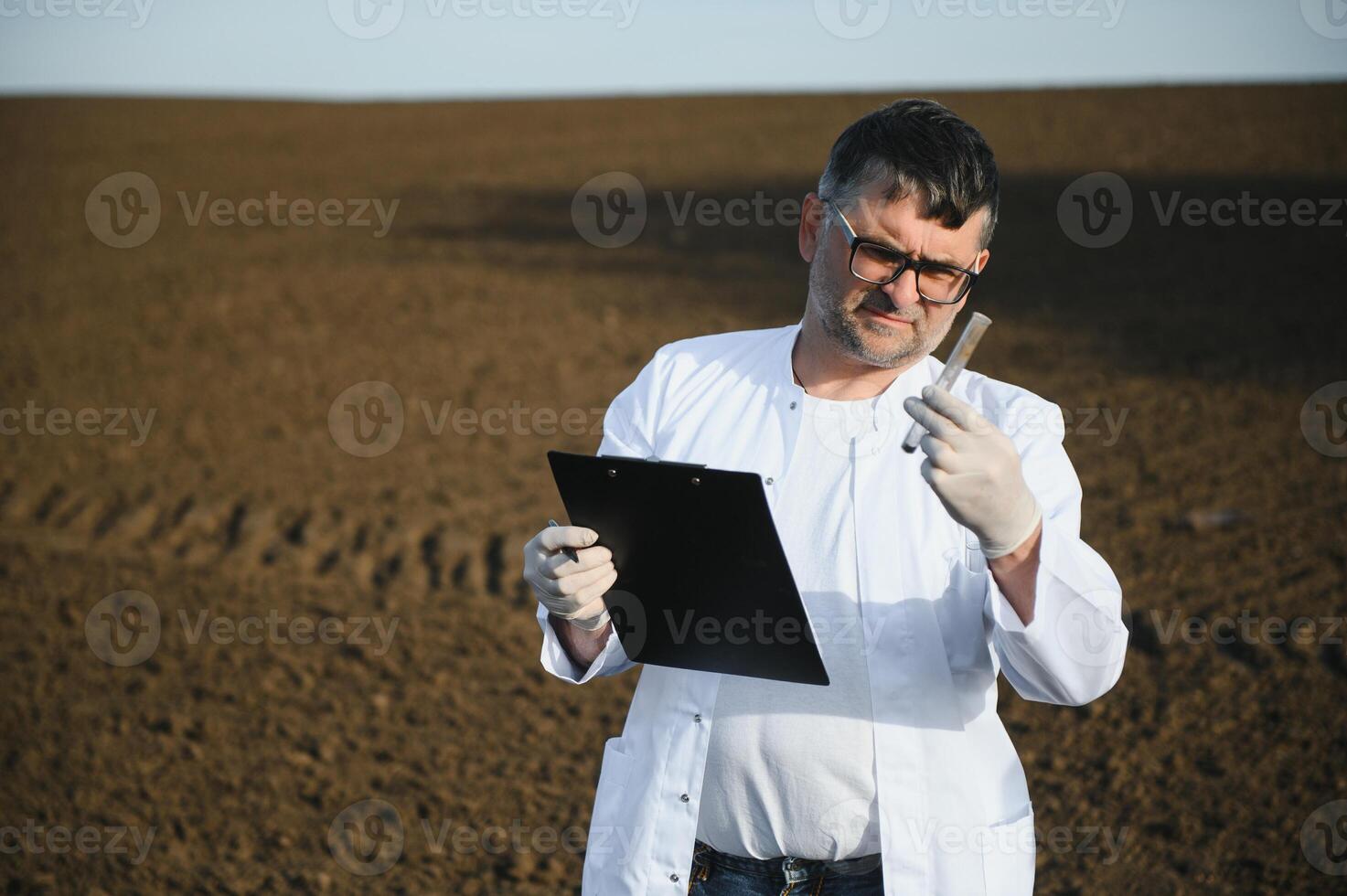 POV view of farmer owner control soil quality before seed plant. Future agriculture concept. photo
