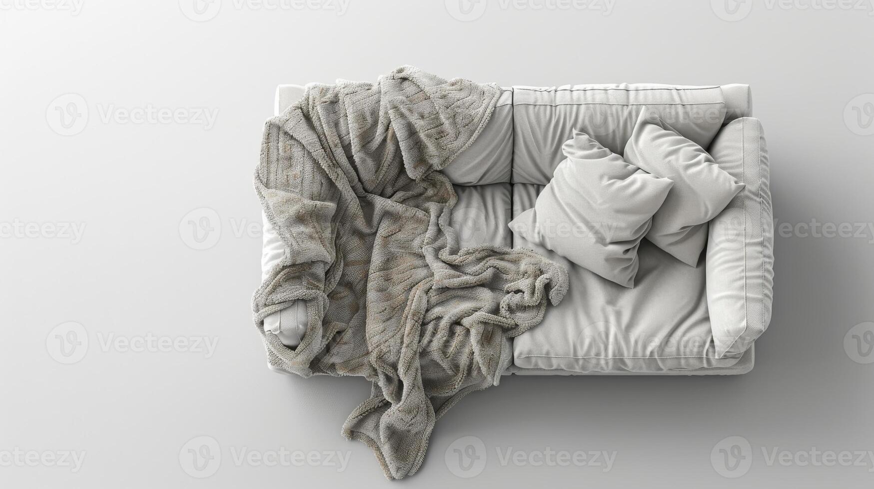 Cozy Gray Couch With Wrinkled Blanket and Soft Pillows in an Inviting Living Room Setting. photo