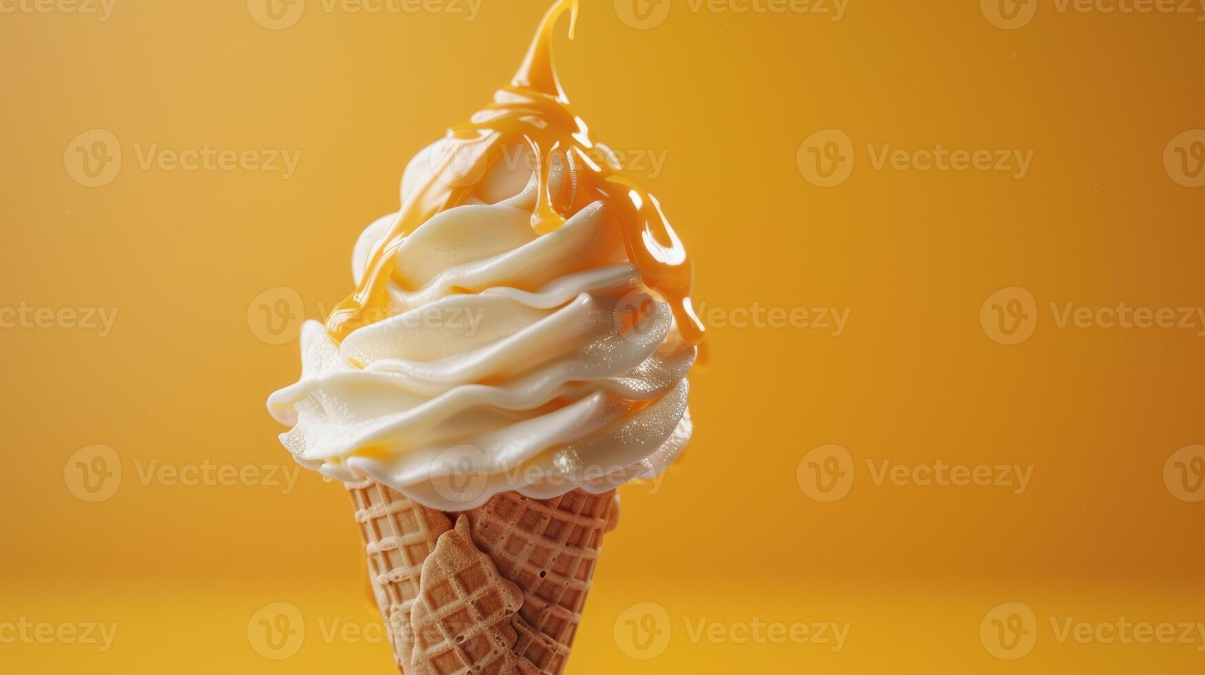 Delicious Swirl of Creamy Vanilla Soft Serve With Golden Caramel Drizzle Against a Vibrant Yellow Background photo