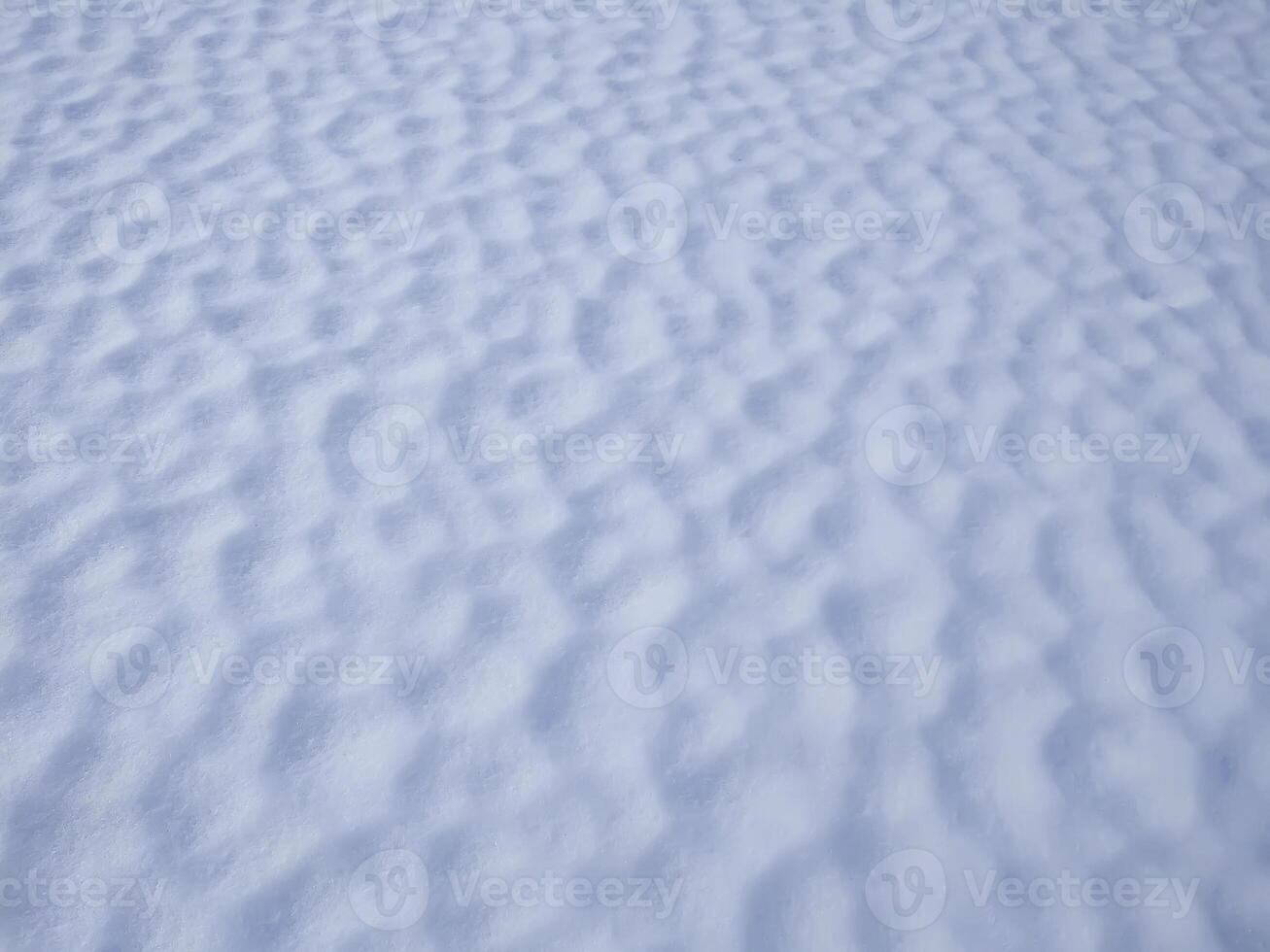 Fresh white deep snow surface photo
