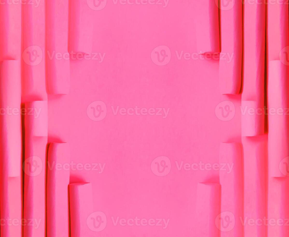 Pink foam curlers on soft pastel background. Hair accessories. photo