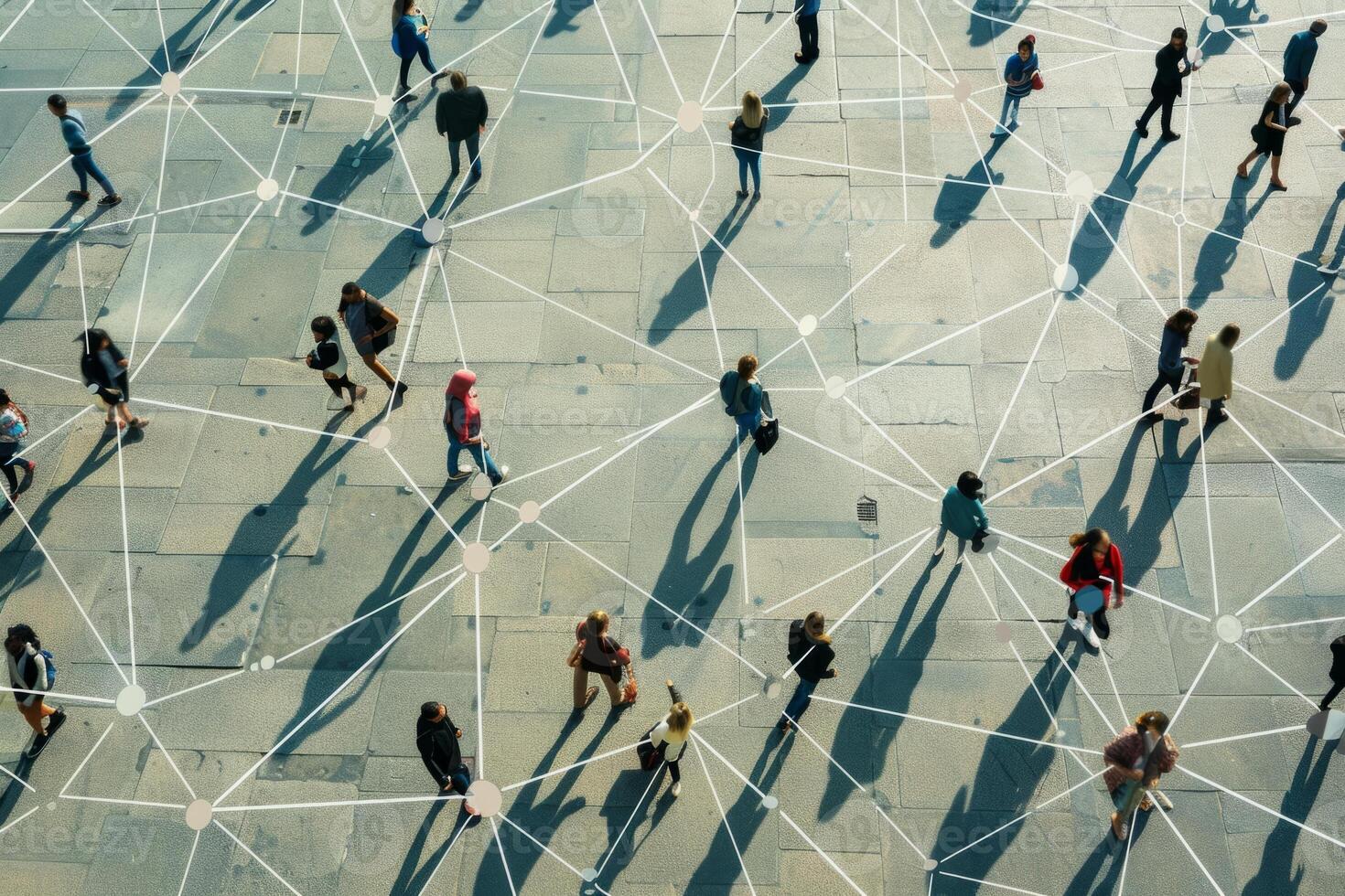 Aerial view of people walking on a large square with connections between them photo