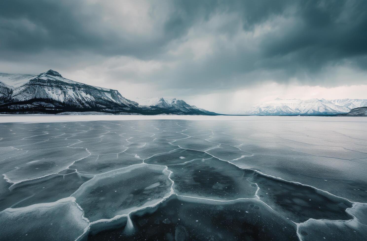 Frozen Lake With Cracked Ice Under Dramatic Cloudy Sky In Winter photo