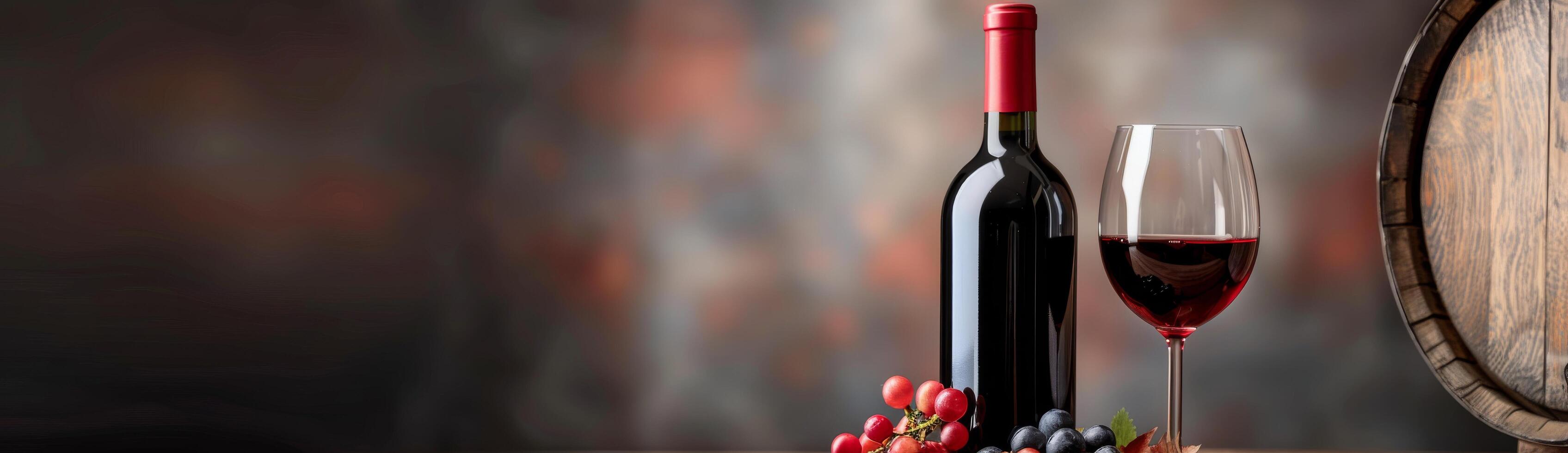 Red Wine Bottle and Glass With Grapes photo