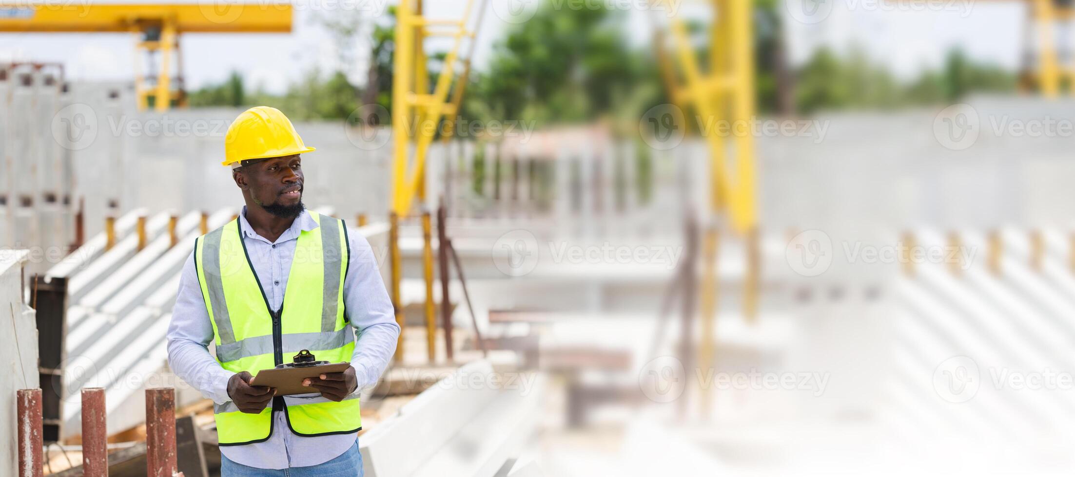 Engineer man in hardhats working at construction site, Foreman checking project at the precast concrete factory site photo