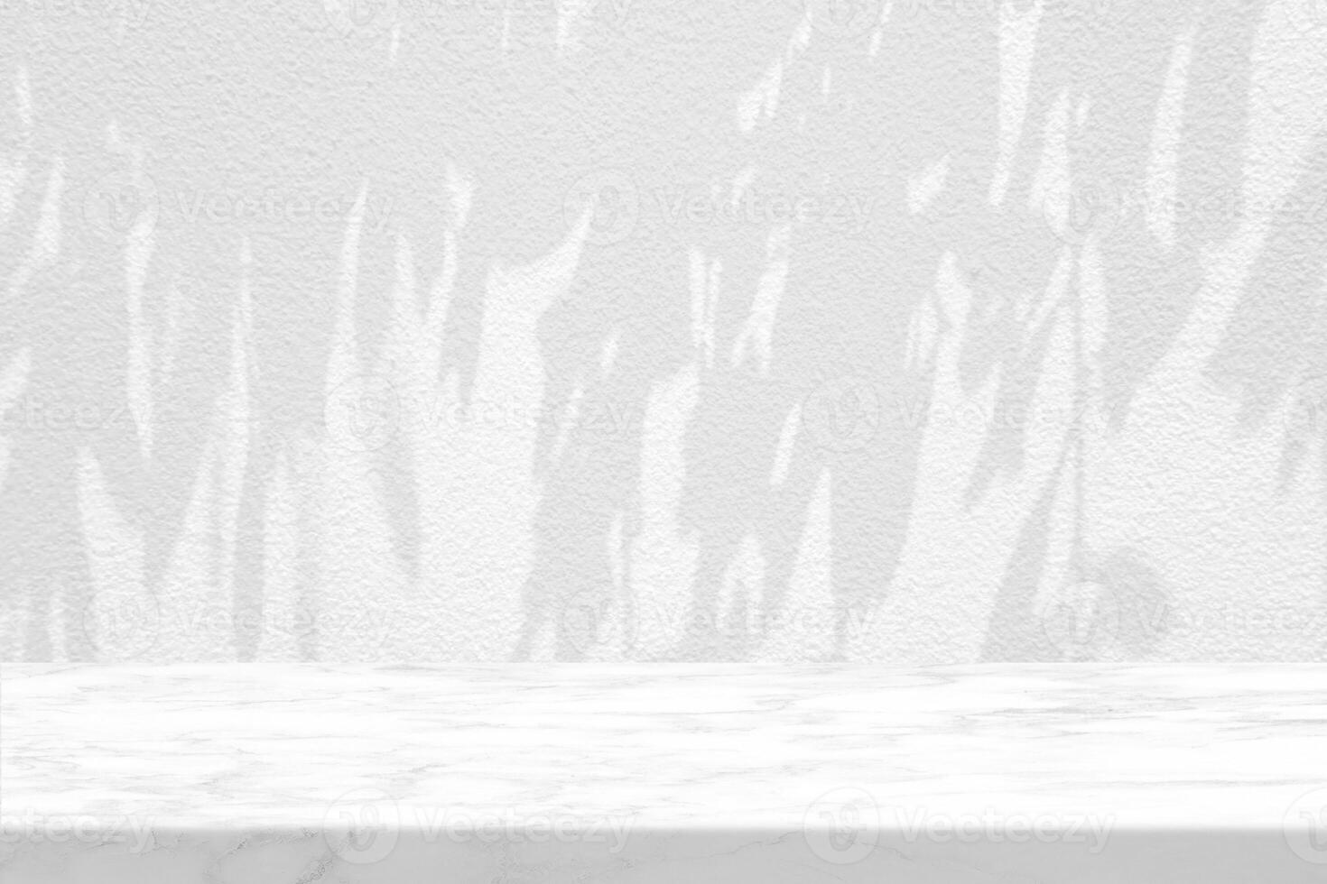 Marble Table with Leaves Shadow on Stucco Wall Texture Background photo