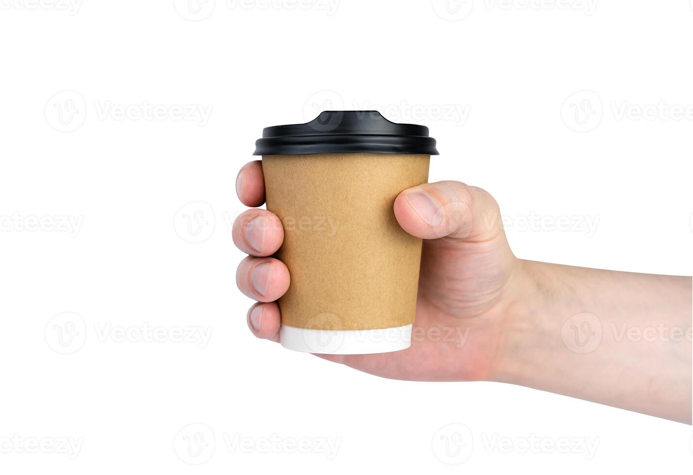 Man's hand holds a craft disposable paper cup with fresh coffee isolated on a white background. photo