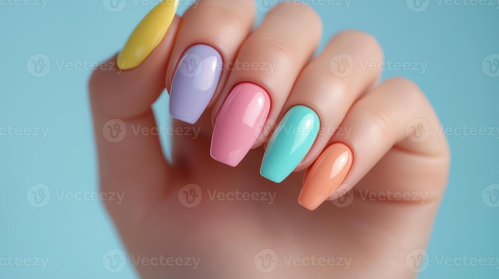 Woman hand with pastel rainbow color photo