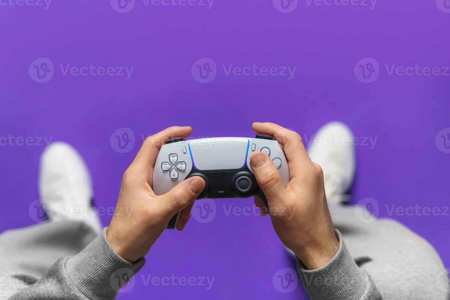 Hand hold new joystick. Gamer play game with gamepad controller. Gaming man holding simulator joypad. Person with keypad joystic in arms. happy to win. Gaming concept. photo