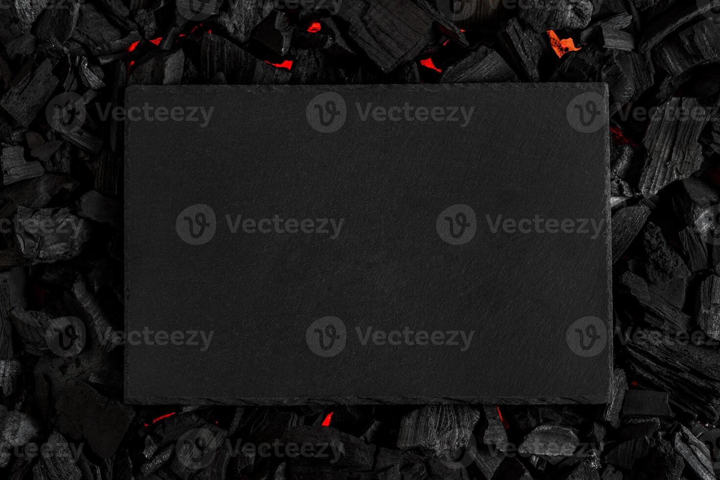 Black slate charcoal board. Blank for a poster, banner or postcard. Textured back photo