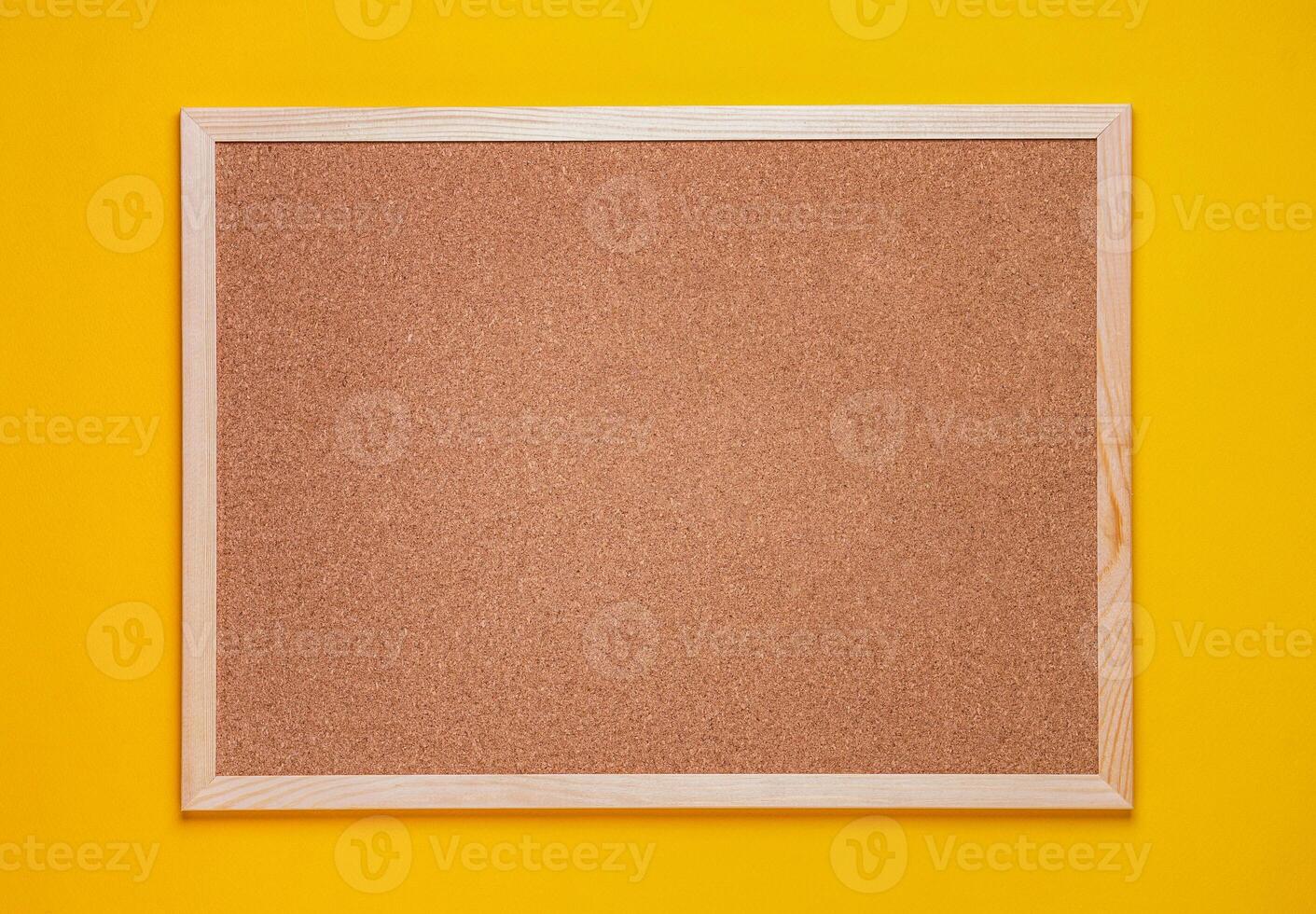 multicolored corkboard stickers pinned with buttons. yellow background. photo