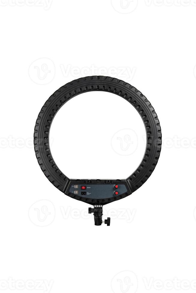 Closeup of circular neon LED lamp isolated white background. Popular modern light for make-up and beauty portraits. photo