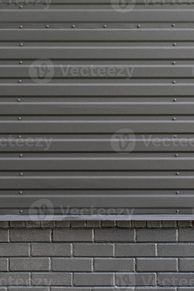 Gray city wall. Dark gray urban background. Copy space for text.Abstract background corrugated gray metal for wall pattern, industrial. photo