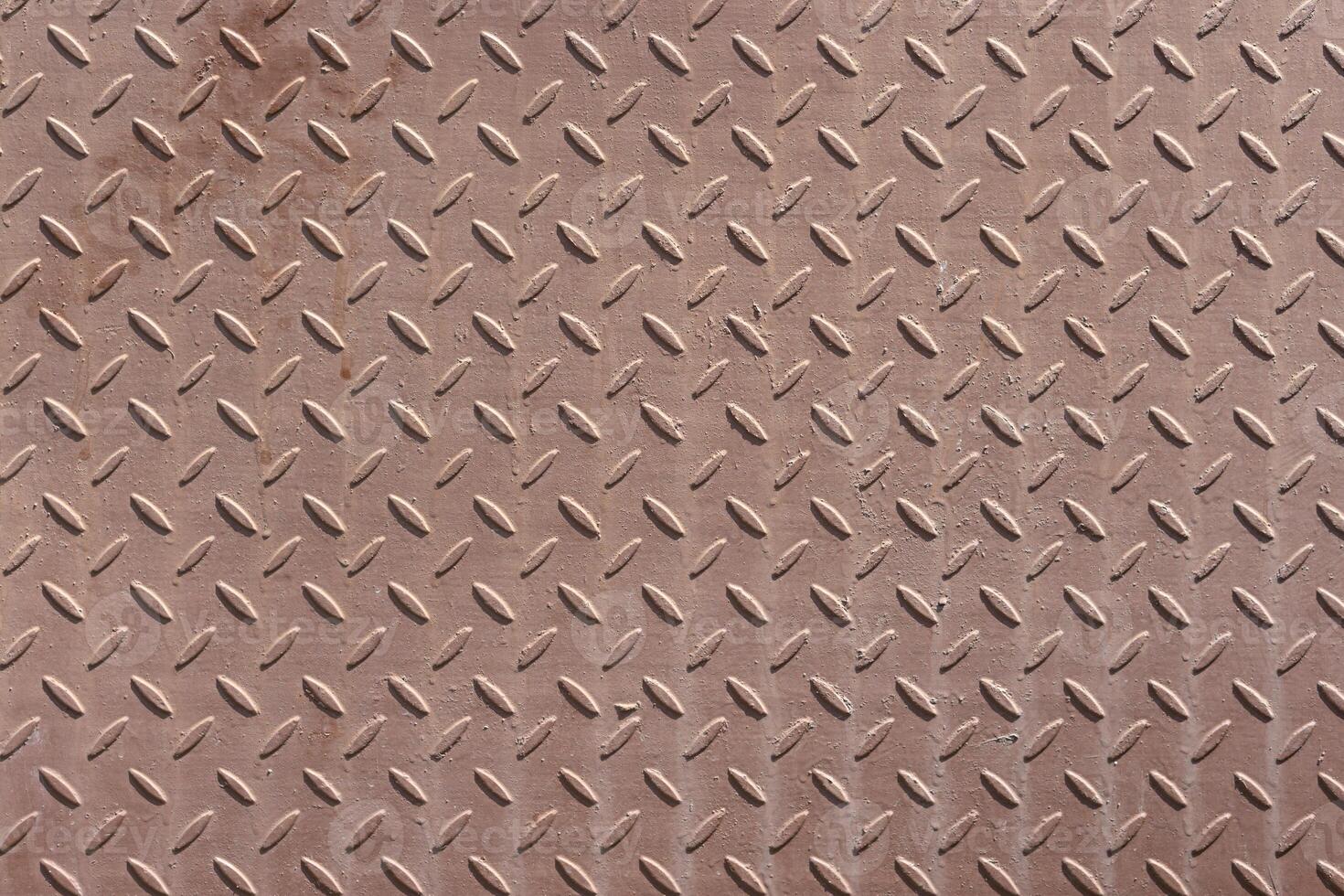Corrugated metal surface with diamond plate texture. The diamond steel metal sheet. Pattern of old metal diamond plate photo