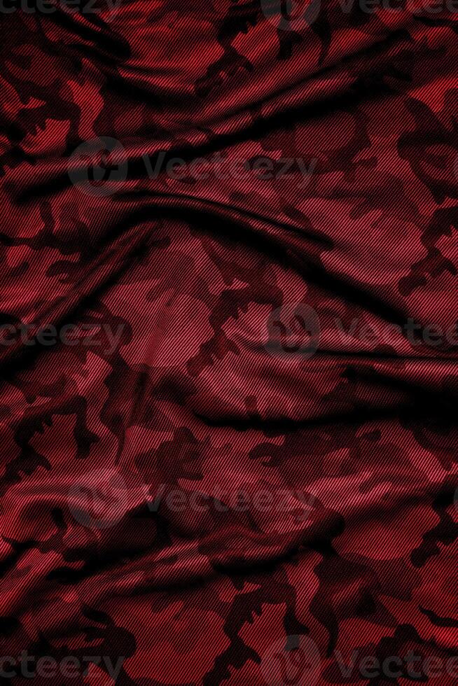 Camouflage pattern. Trendy dark red camouflage fabric. Military texture. Dark back. photo