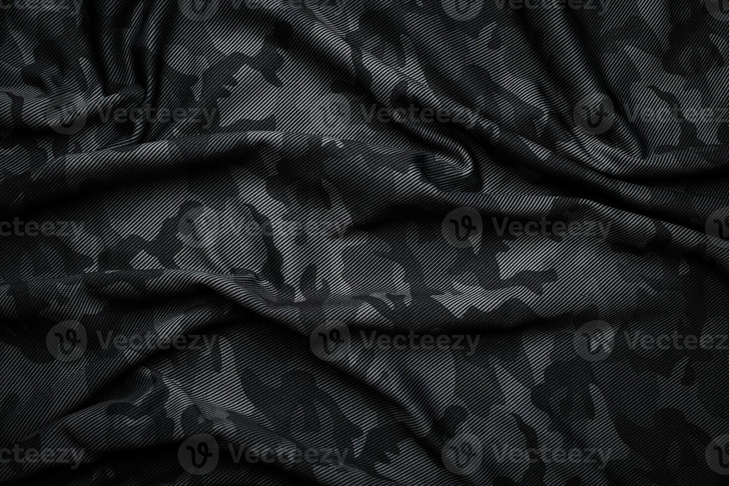 Camouflage pattern. Trendy dark gray camouflage fabric. Military texture. Dark back. photo