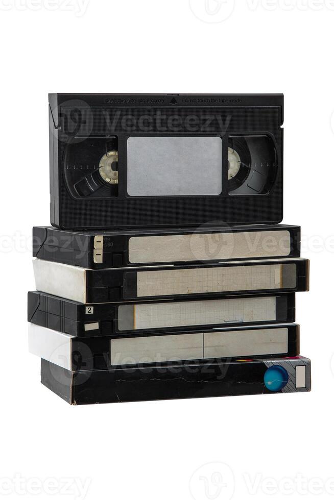 Pile of VHS cassettes cassettes. Vintage media. Isolate on a white back. photo