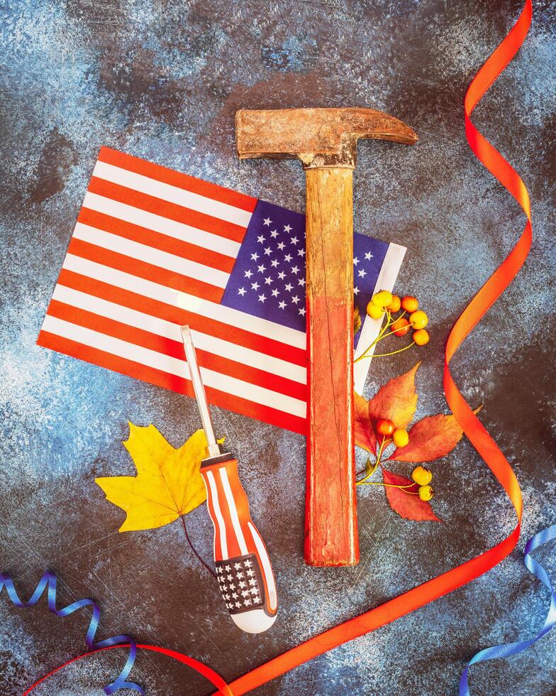 Labor Day card with american flag, hammer and screwdriver photo