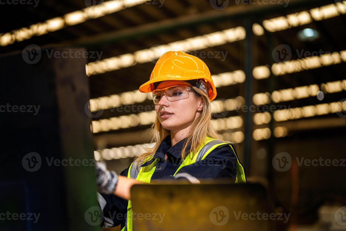 people with machinery equipment plant technology. smart industry worker operating. Factory engineer woman standing confident to control panel switch. Worker works at heavy machine at industry factory. photo
